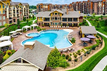 Heated, zero-entry resort style pool with private cabanas